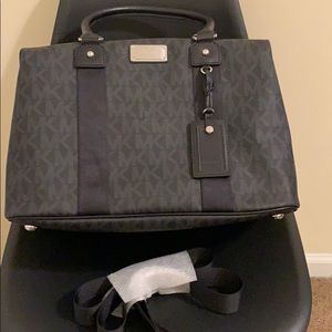 Brand new Michael Kors Large Weekender.